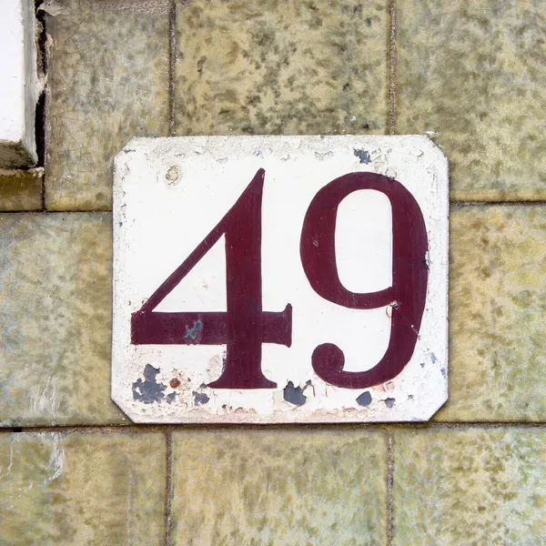Weathered House Number Forty Nine — Stock Photo, Image