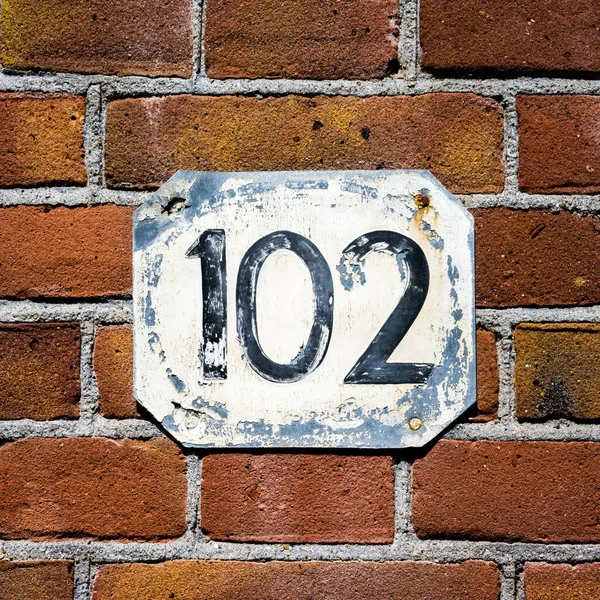 Weathered House Number One Hundred Two — Stock Photo, Image