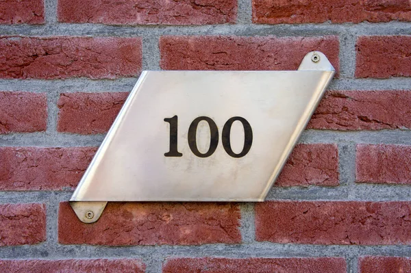 New Modern House Number One Hundred Stainless Steel Plate Mounted — Stock Photo, Image