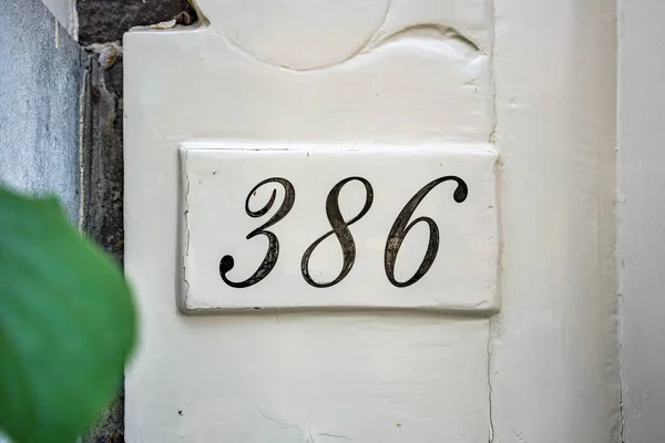 Hand Painted House Number Three Hundred Eighty Six — Stock Photo, Image