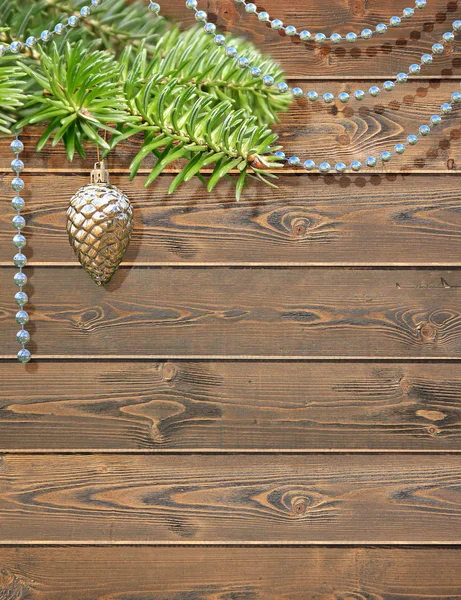 ahşap arka plan üzerinde Noel oyuncaklar