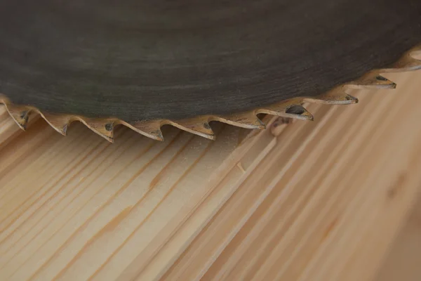 Circular saw on wood — Stock Photo, Image