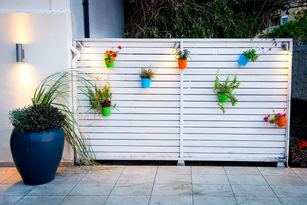 Outdoor minimalistic flower wall decoration — Stock Photo, Image