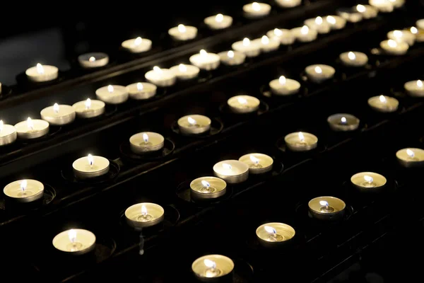 Lots Lit Small Candles Catholic Church Selective Focus Close — Foto de Stock