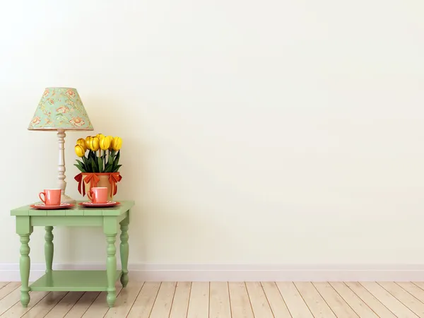Зелений бічний стіл з декором в інтер'єрі — стокове фото
