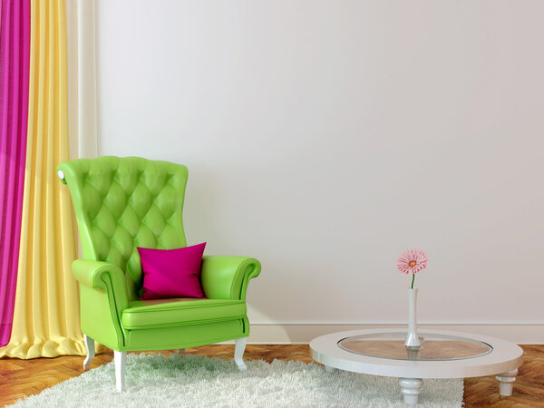 Green armchair in the interior