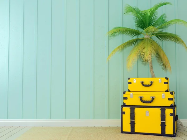 Yellow bags and palm tree — Stock Photo, Image