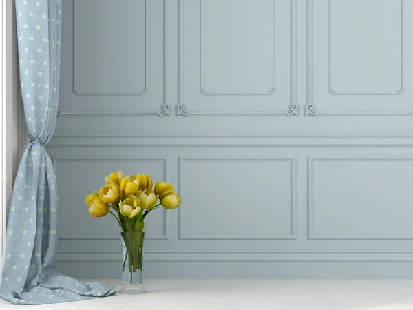 Żółte tulipany na tle muru niebieski — Zdjęcie stockowe