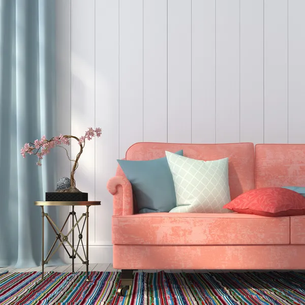Salmon-colored sofa and a metal table — Stock Photo, Image