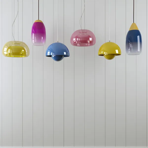 Lampes suspendues de couleur variée contre un mur blanc — Photo