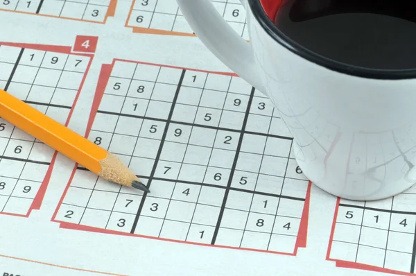 Close Sudoku Puzzles Pencil Cup Coffee — Stock Photo, Image