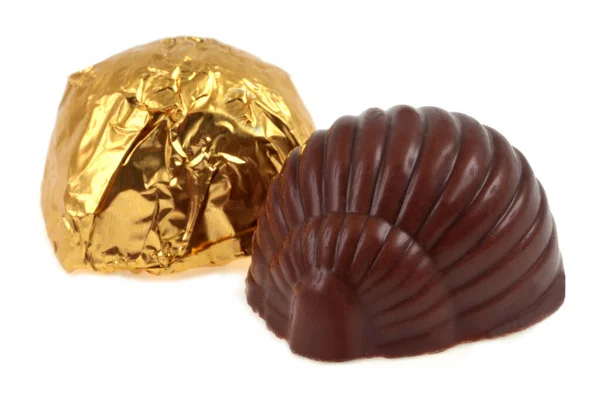 Caracóis Chocolate Incluindo Ainda Envolto Close Fundo Branco — Fotografia de Stock