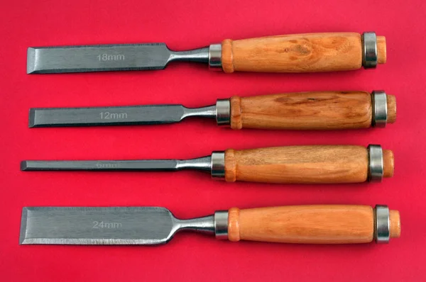 Wood Chisels Different Sizes Red Background — Foto Stock