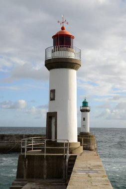 Lighthouses at the entrance to the port of Le Palais in Brittany