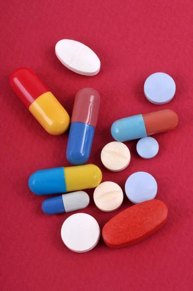 Assortment Drugs Close Red Background — Stock Fotó