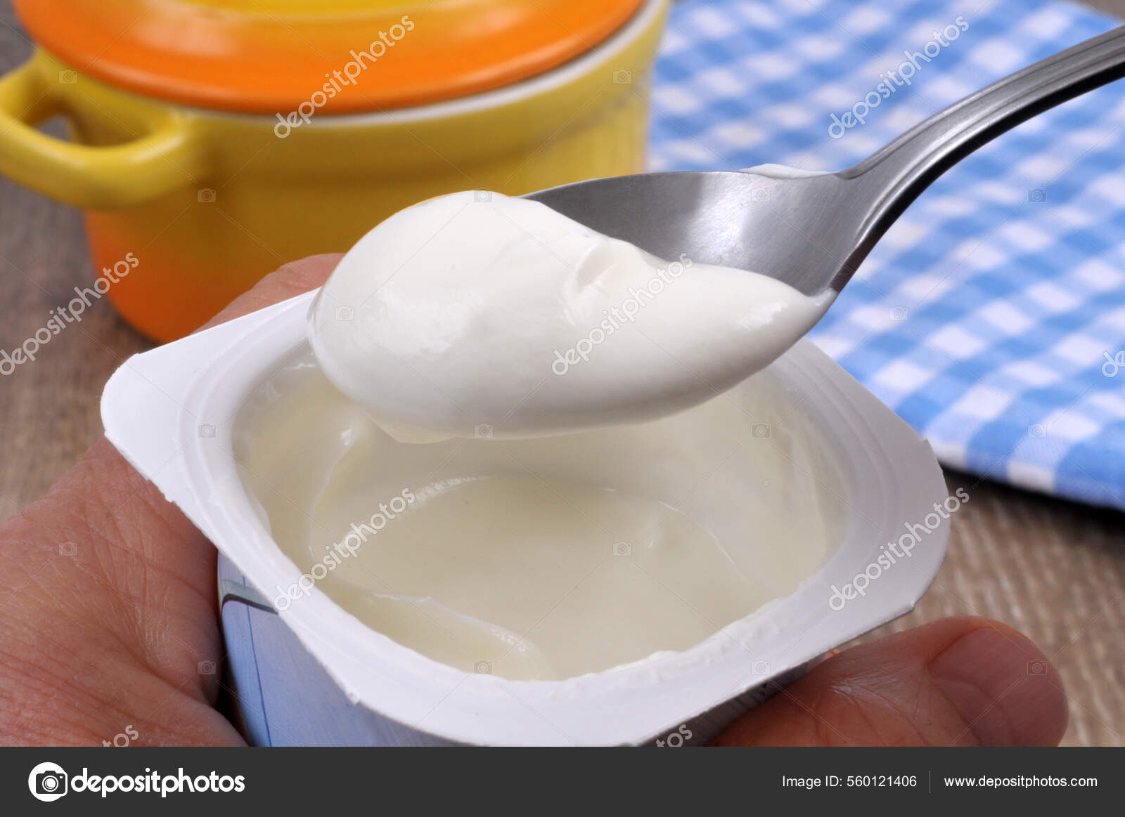 https://st.depositphotos.com/17499462/56012/i/1600/depositphotos_560121406-stock-photo-eating-plain-yogurt-spoon-close.jpg