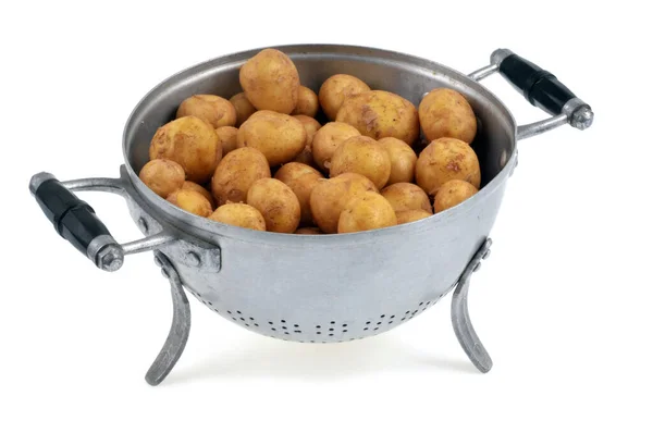 Raw New Potatoes Colander Close White Background — Stockfoto