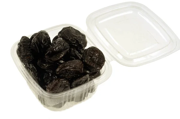 Plastic Tray Prunes White Background — Stock Photo, Image