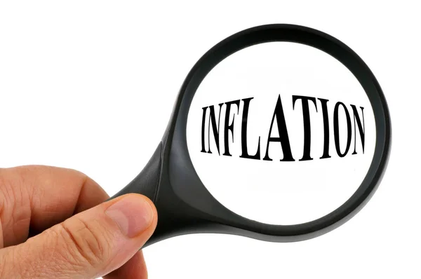 Inflationskoncept Med Förstoringsglas Handen Vit Bakgrund — Stockfoto