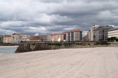 Riazor beach of the city of La Coruna in Spain clipart