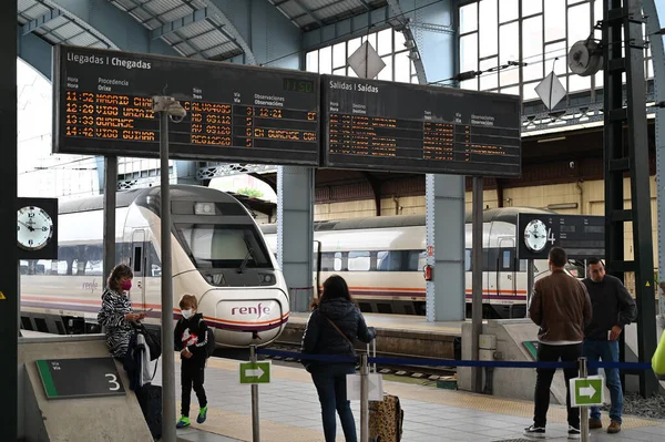 Travelers on the platform of La Coruna station