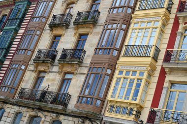 Facades of buildings with bow windows in the city of Gijon in Spain