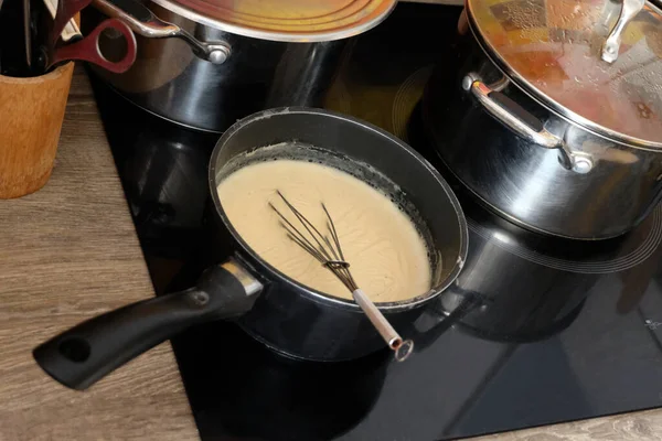 Preparing Bechamel Sauce Saucepan Kitchen Whisk Hob — Fotografie, imagine de stoc