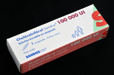 Cholecalciferol box close up on black background