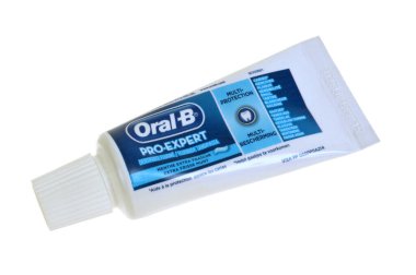 Tube of Oral-B brand Pro-Expert toothpaste close up on white background