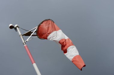 Windsock close up on gray sky background
