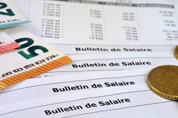French salary slips with euros close-up
