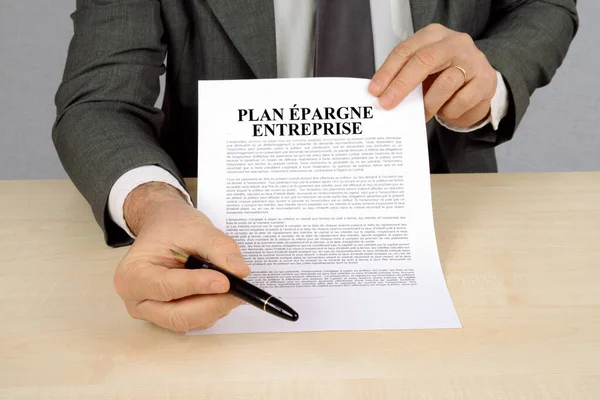 Man Holding French Company Savings Plan Contract Pen — Foto de Stock