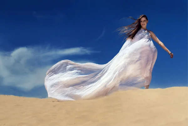 Attarctive woman in long white dress — Stock Photo, Image