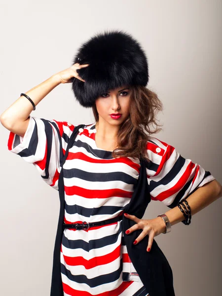 Pretty girl in furhat — Stock Photo, Image