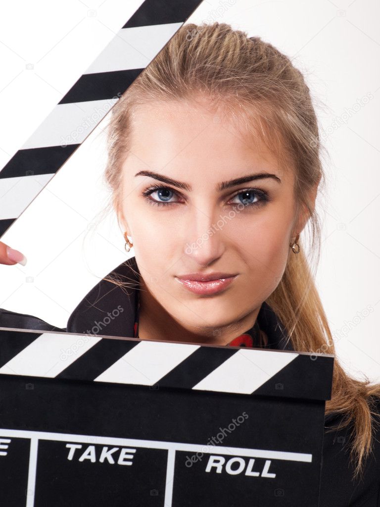 Portrait of beautiful girl with film slate
