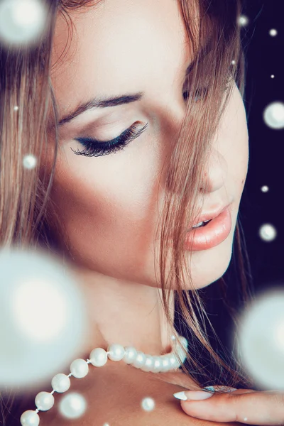 Portrait of female with lots of pearls — Stock Photo, Image