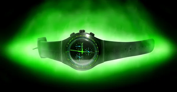 Wristwatch with green lights — Stock Photo, Image