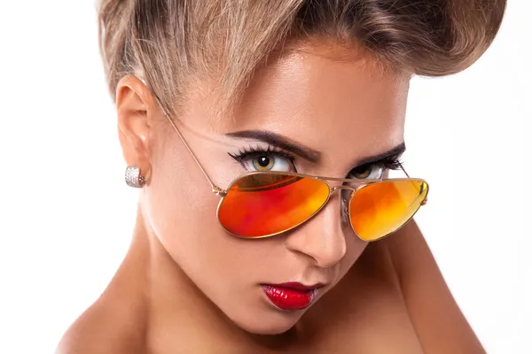 Gorgeous woman in sunglasses in studio — Stock Photo, Image