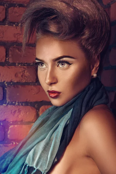 Portrait of caucasian female near brick wall — Stock Photo, Image