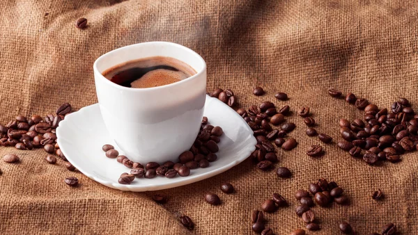 Horizontal still life with cup of coffee — Stock Photo, Image