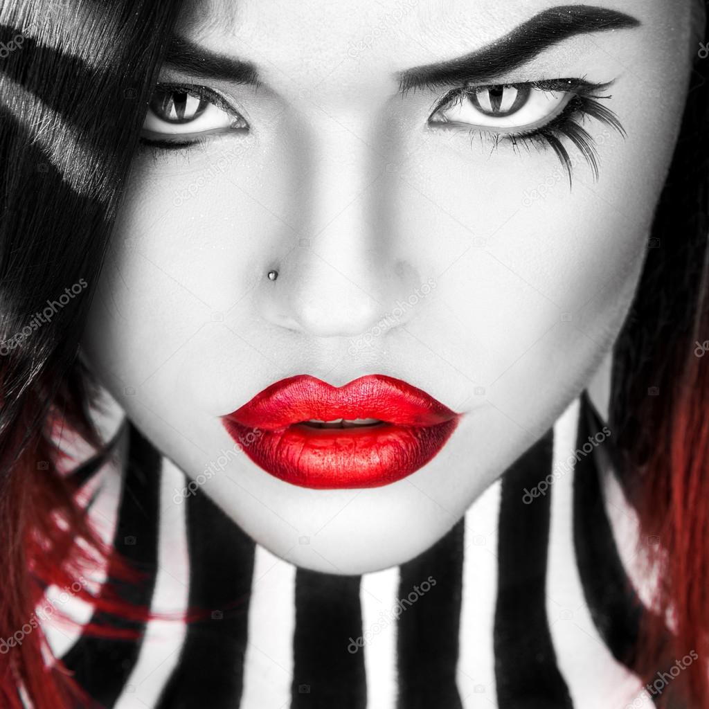 Black and white portrait of beauty woman with red lips