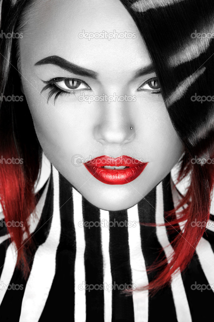 desaturated Portrait of pretty caucasian woman with stripes on b