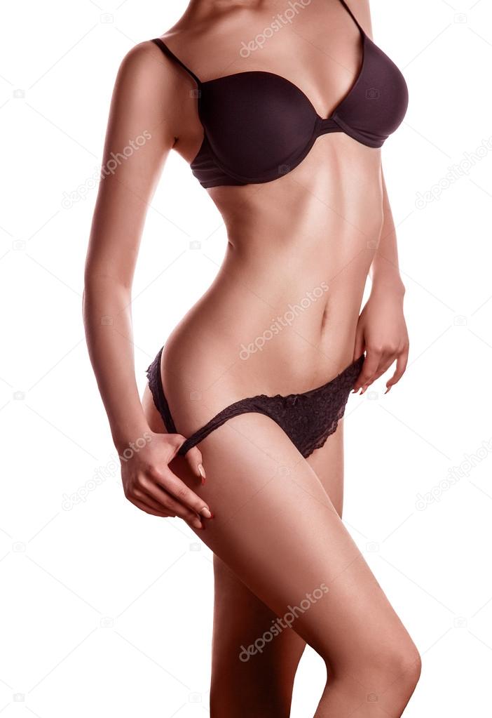 tan skin woman in black lingerie
