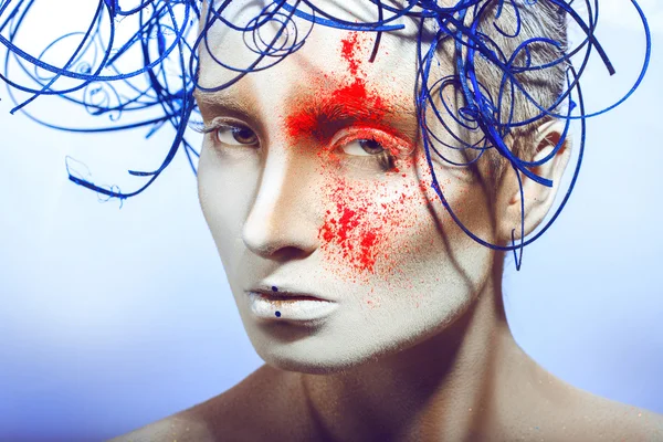 Sexual woman with body art and neon powder in studio — Stock Photo, Image