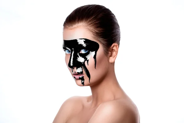 Black paint on woman's face — Stock Photo, Image
