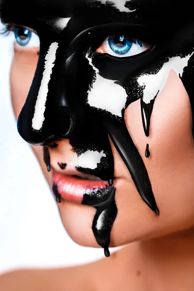 Vertical photo of sexy woman with black paint on face — Stock Photo, Image