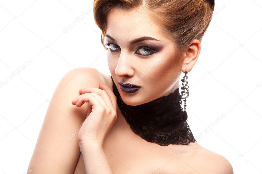 Horizontal portrait of fashion model with make up on white backg