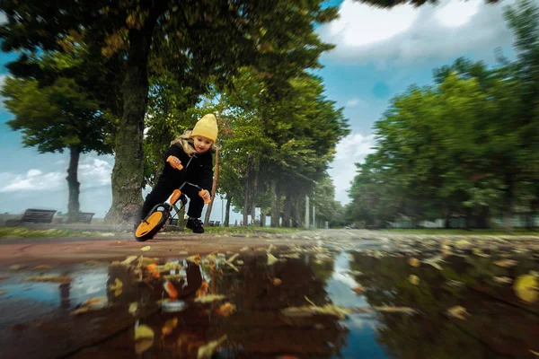 Cutie Little Girl Rides Puddles Bicycle Autumn Park — Stock Photo, Image