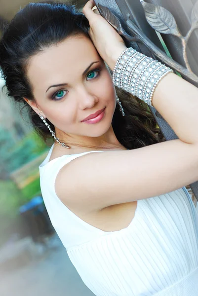 Beautiful woman in white dress — Stock Photo, Image