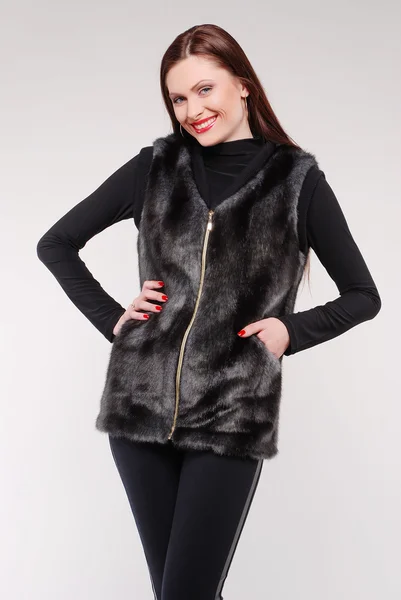 Beautiful woman in fur jacket — Stock Photo, Image